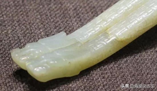 汉代玉璧 龙形玉佩的解析图