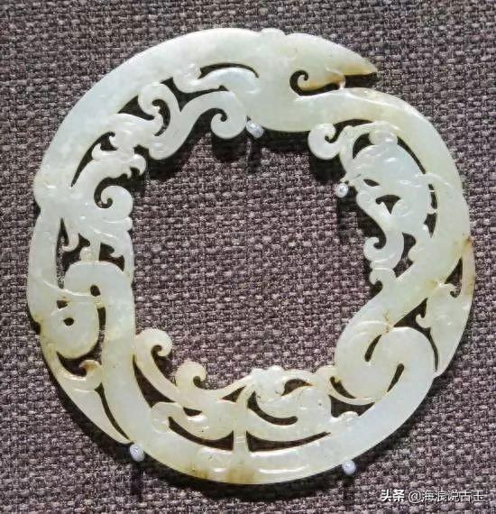 汉代玉璧 龙形玉佩的解析图