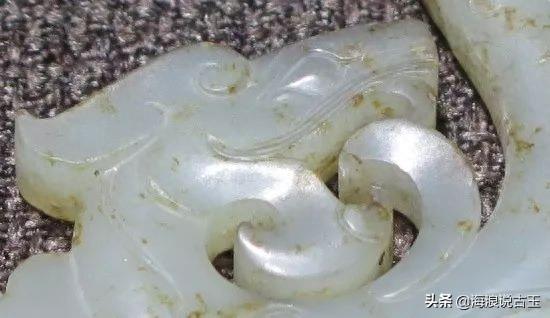 汉代玉璧 龙形玉佩的解析图