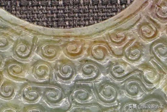 汉代玉璧 龙形玉佩的解析图