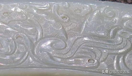 汉代玉璧 龙形玉佩的解析图