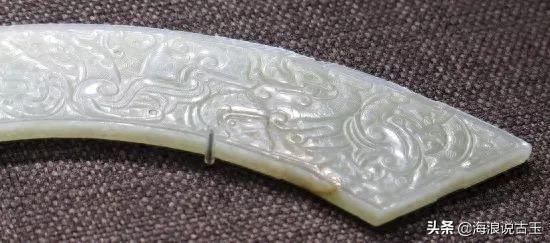 汉代玉璧 龙形玉佩的解析图